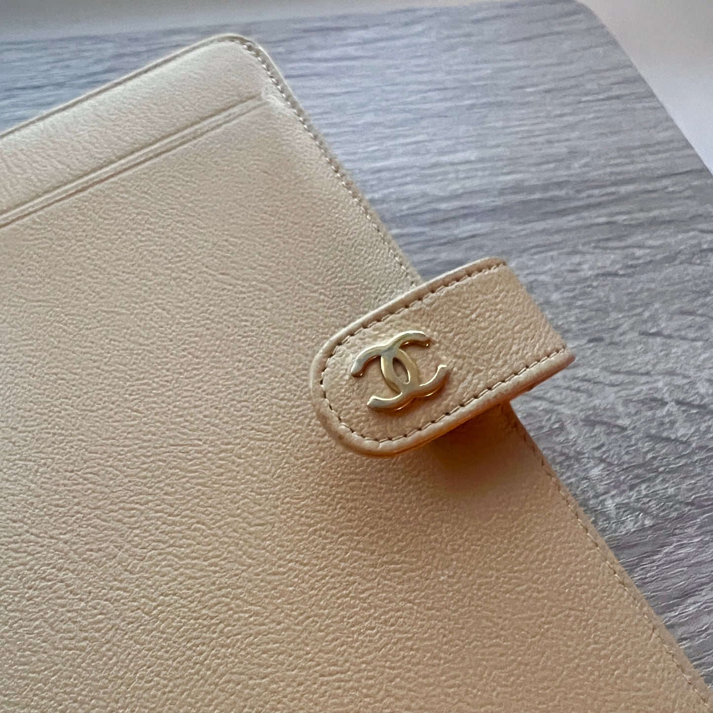 beige chanel lanner diary tan logo